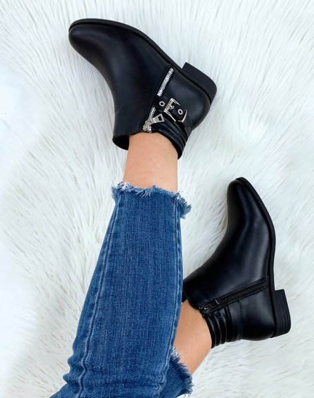 Low black ankle boots with decorative zip