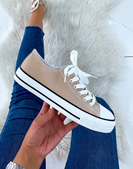 Low-top sneakers in beige fabric with laces