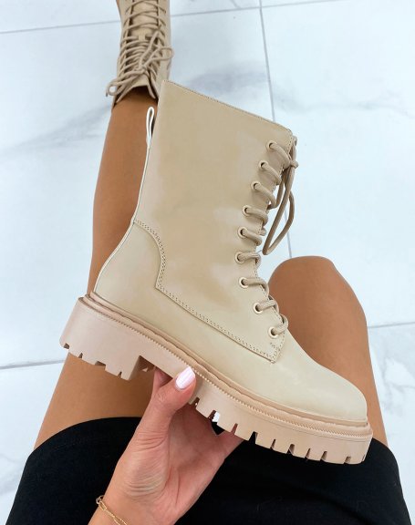 Matte beige high-top ankle boots with lace and heeled sole