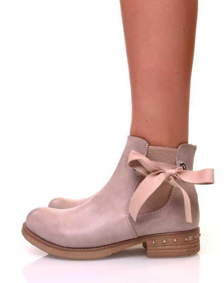 Old pink Chelsea boots with bows