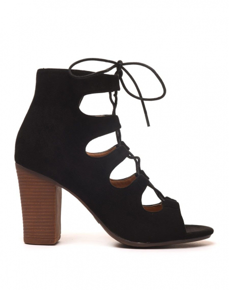 Open and laced black suede effect low heeled boots