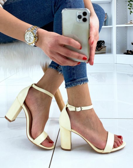 Pastel yellow heeled sandals with thin straps