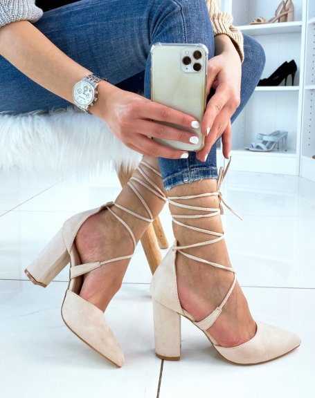 Pumps with a thick beige heel and long straps