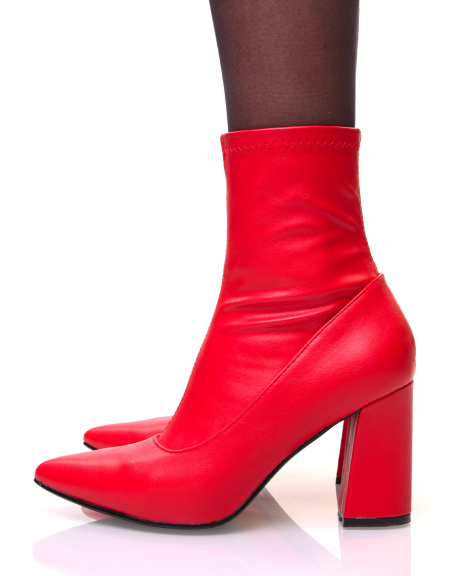 Red ankle boots with square heels and pointy sock-effect toes
