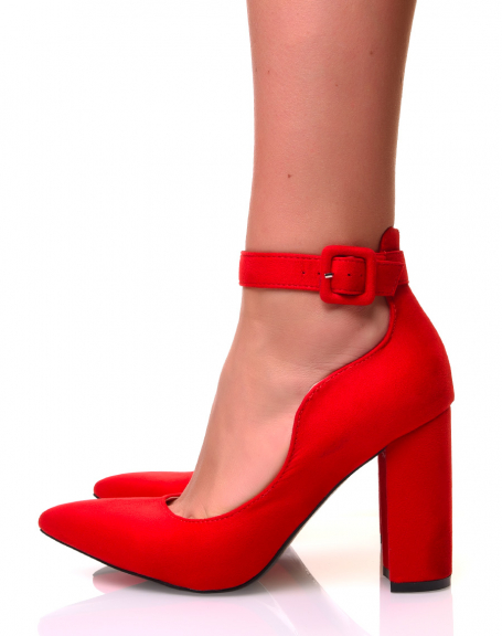 Red suede pumps with straps and a thick heel