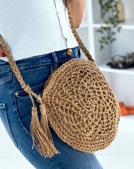 Round shoulder bag in natural straw