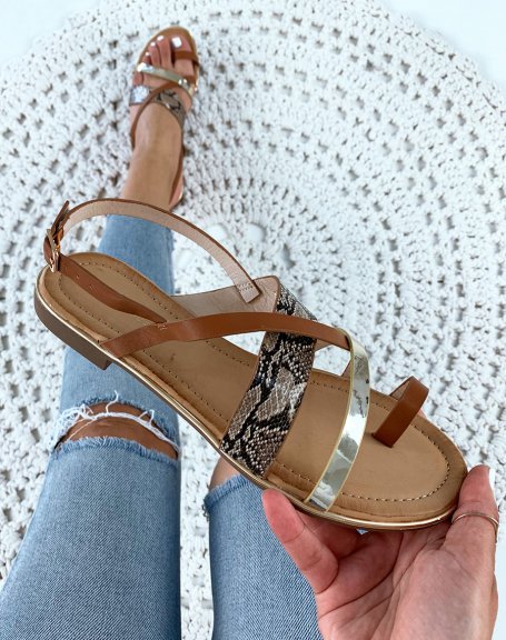 Sandals with multiple crisscrossing golden camel and python effect straps