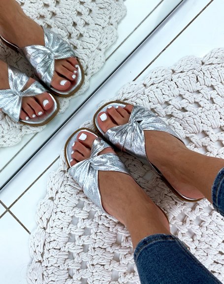 Silver flat sandals with crisscross straps