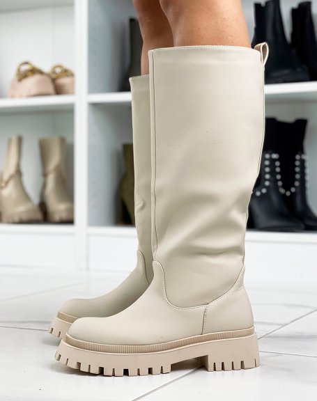 Tall beige rubber boots with chunky sole