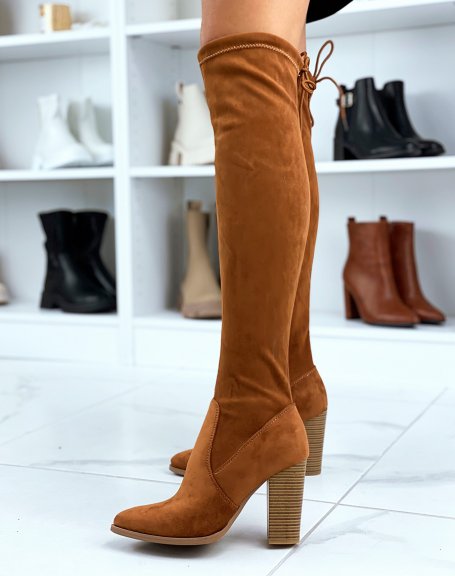 Thigh high boots with camel heel and pointed toe