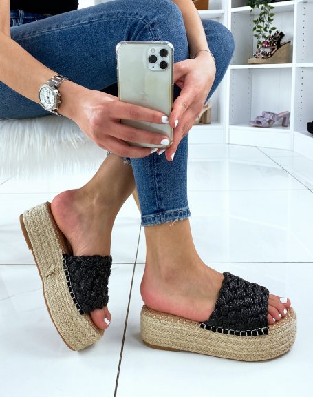 Wedge mules with large black braided strap