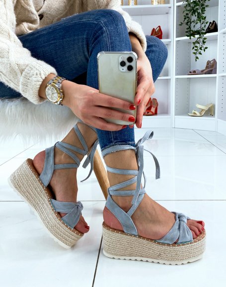 Wedge sandals in pastel blue suede with laces