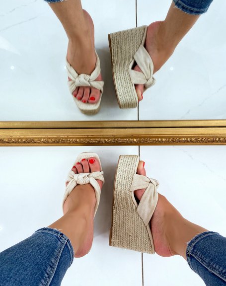 Wedges in beige suede with crisscrossed straps