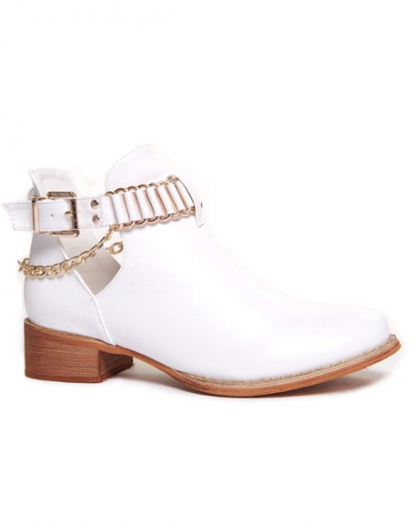 White ankle boot with cutout and metallic details