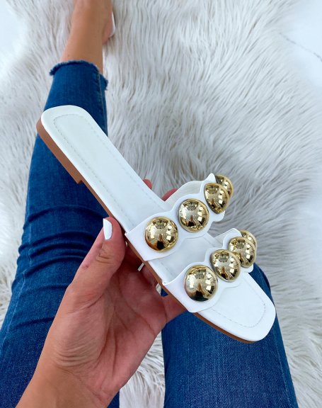White flat mules with double straps and golden pearls