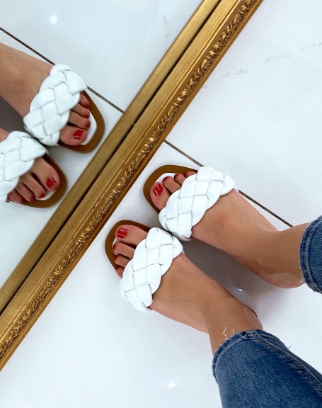 White flat mules with large braided strap