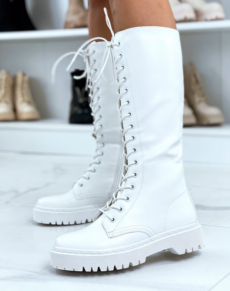 White lace-up boots with flat lug sole