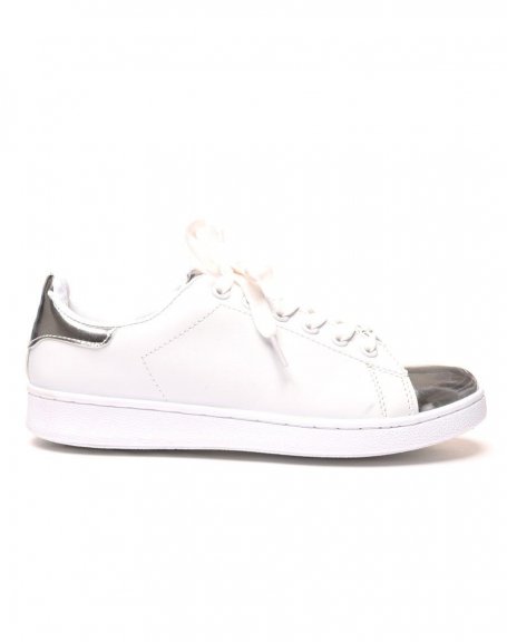 White low top sneakers with silver tongue and toe