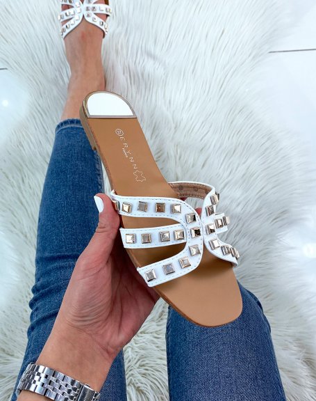 White mules with multiple straps and studs