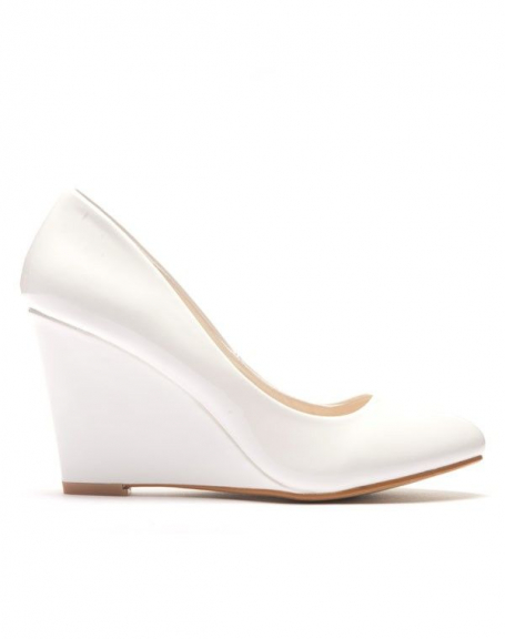 White patent pump with wedge heel