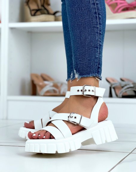 White sandals with thick straps and notched sole