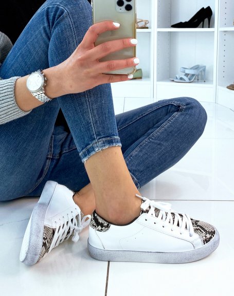 White sneaker with python effect pattern