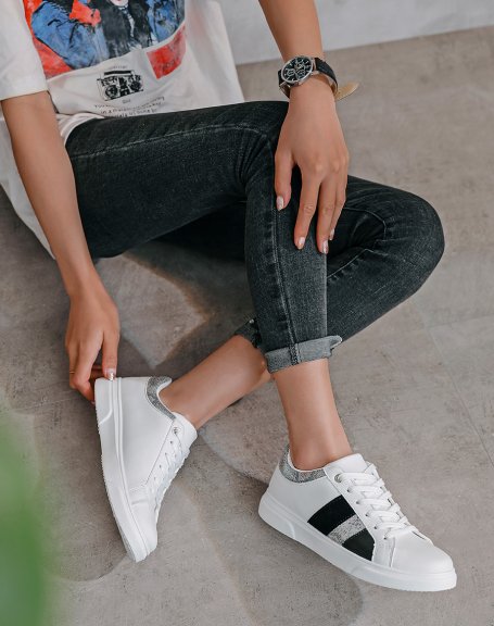 White sneakers with black and silver inserts