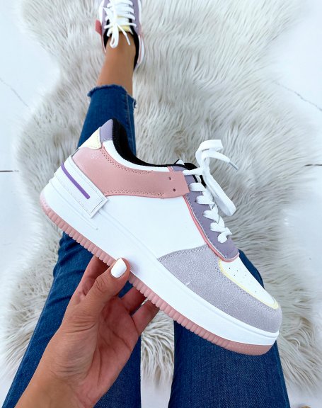 White sneakers with black, gray, pink, purple and pastel yellow panels