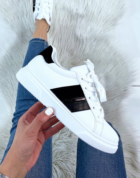 White sneakers with black inserts
