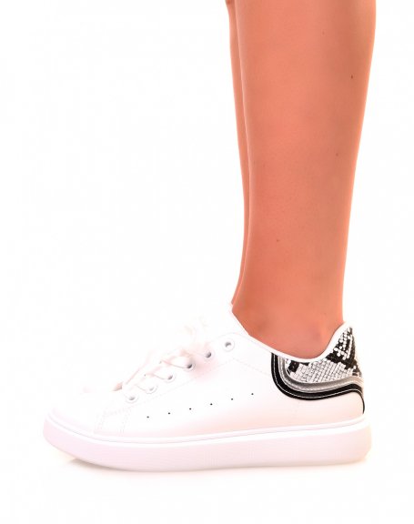 White sneakers with black yoke and python