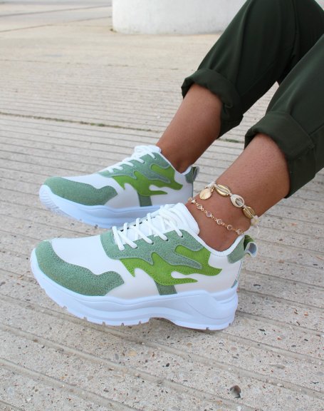 White sneakers with green flame inserts