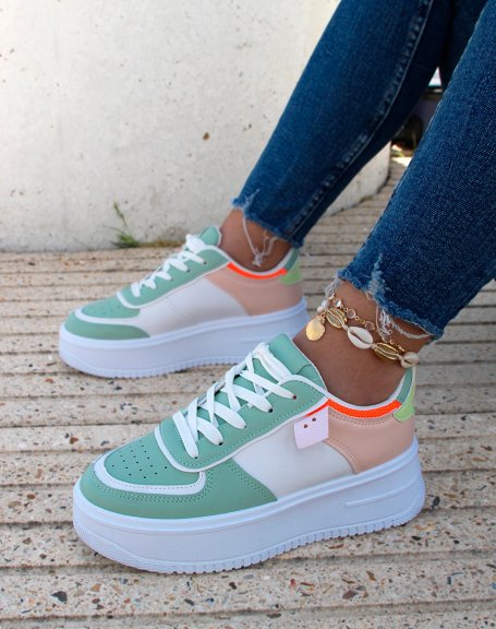 White sneakers with pastel green inserts