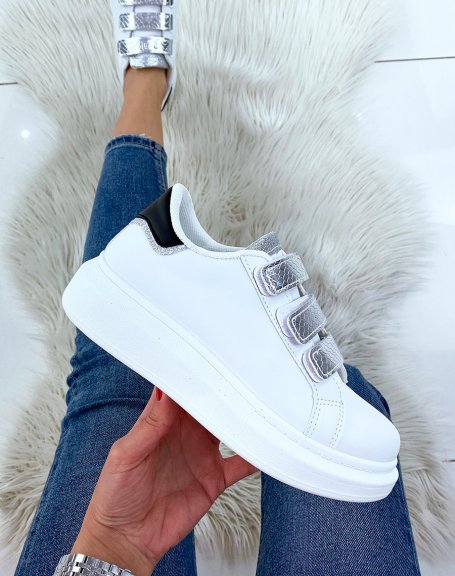 White sneakers with silver velcro and black insert