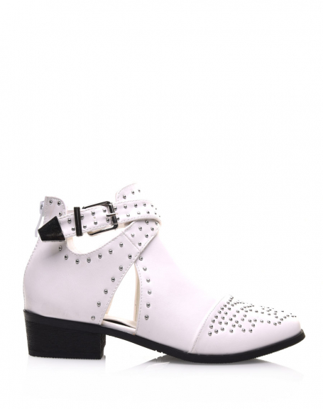 White studded ankle boots with crossed buckles