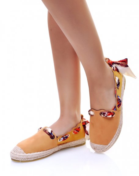 Yellow espadrilles with ribbons