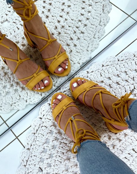 Yellow suedette sandals with low heels and ankle laces