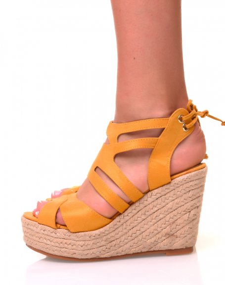 Yellow suedette sandals with wedge heels
