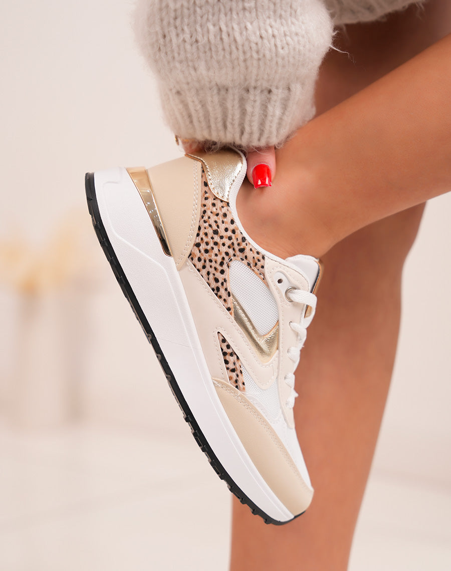 Trendy beige women's sneakers with golden touches and black notch sole