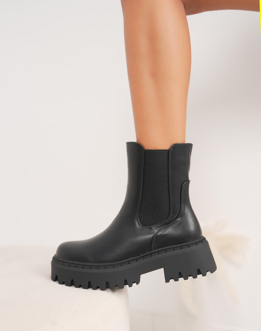 Bottines femme noires style Chelsea à plateforme crantée et intérieur fourré