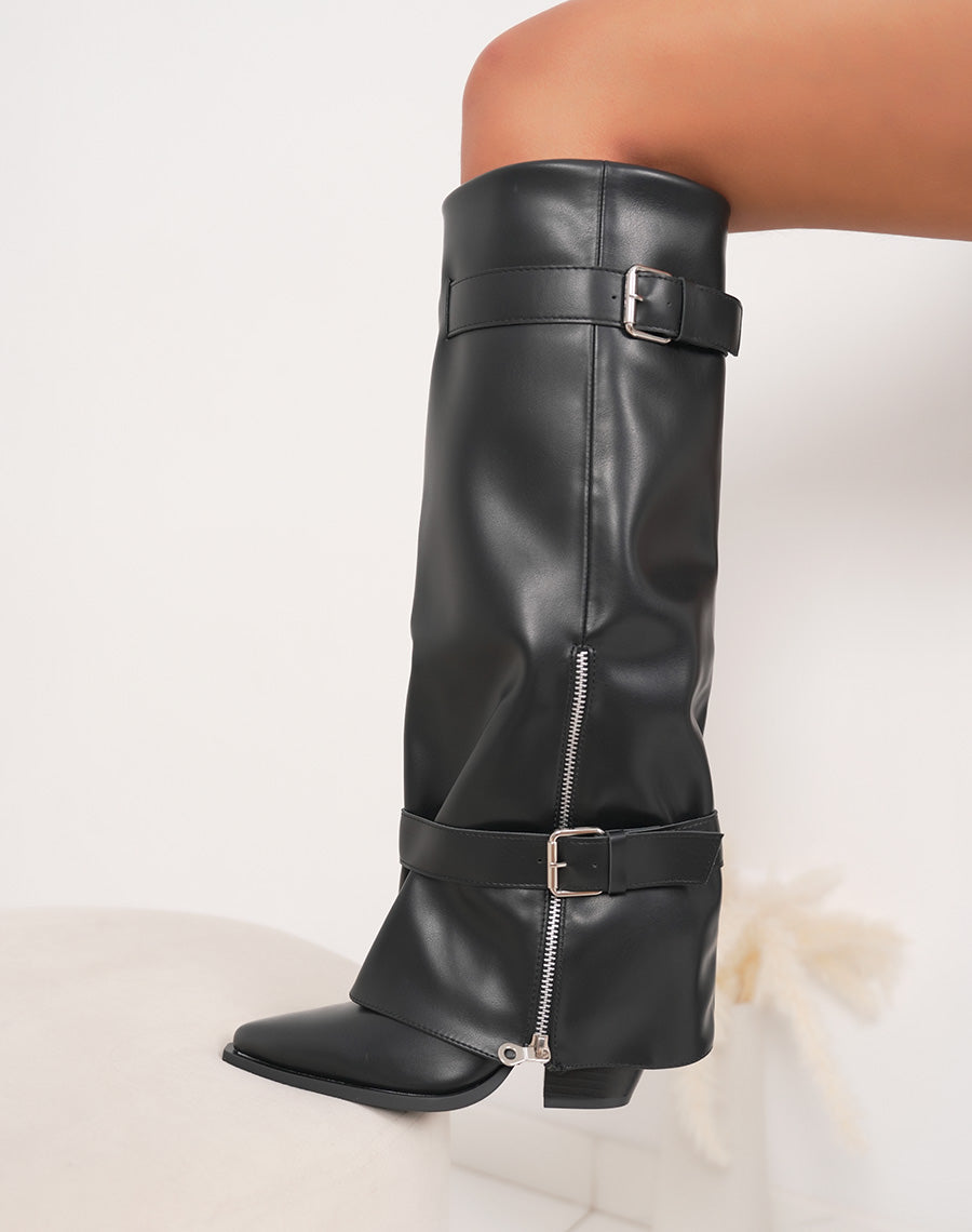Bottes noires à talon biseauté, bout pointu et détails zippés