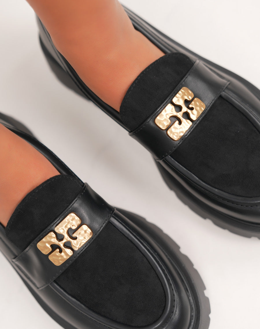 Mocassins noirs bi-matière avec bijou doré
