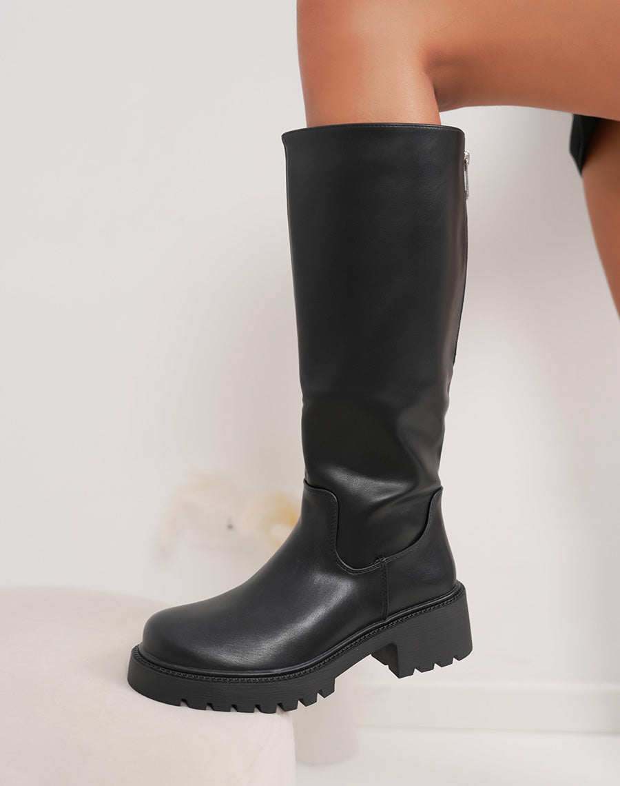 Bottes noires à semelle crantée et zip argenté
