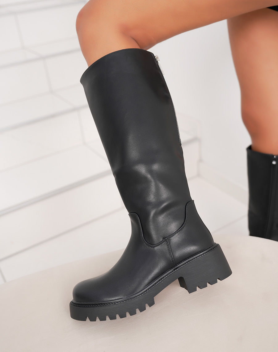 Bottes noires à semelle crantée et zip argenté