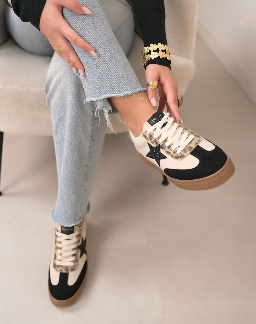 Basket femme noire et beige tendance à plateforme avec étoile pailletée et détail léopard