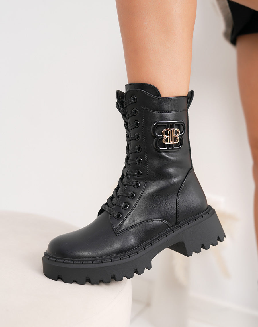 Bottines noires à lacets fourrées avec détail doré