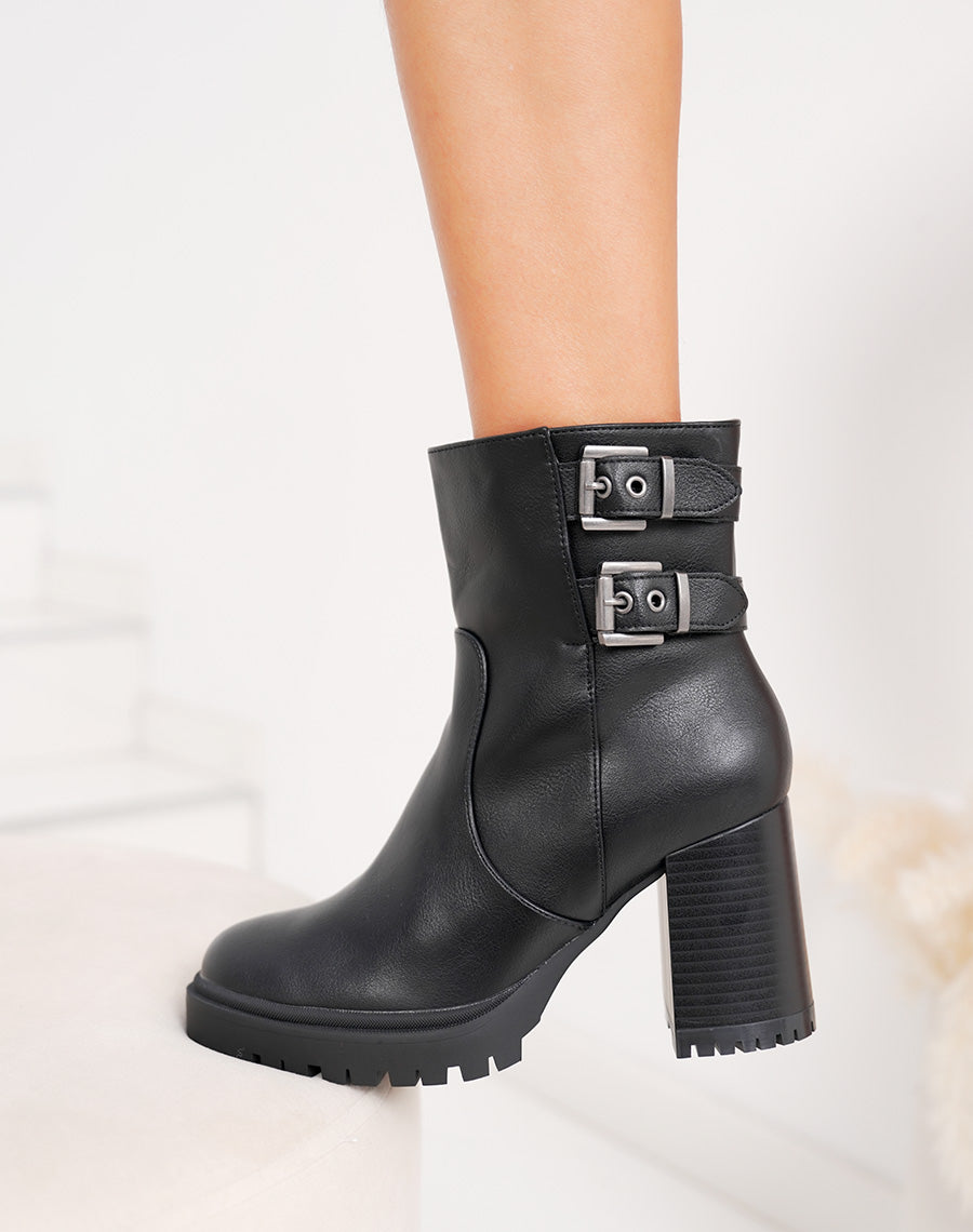 Bottines femme noires à double boucles semelle crantée et intérieur fourré