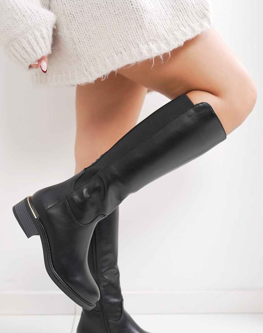 Bottes femme noires cavalières avec élastique et détail doré intérieur fourré