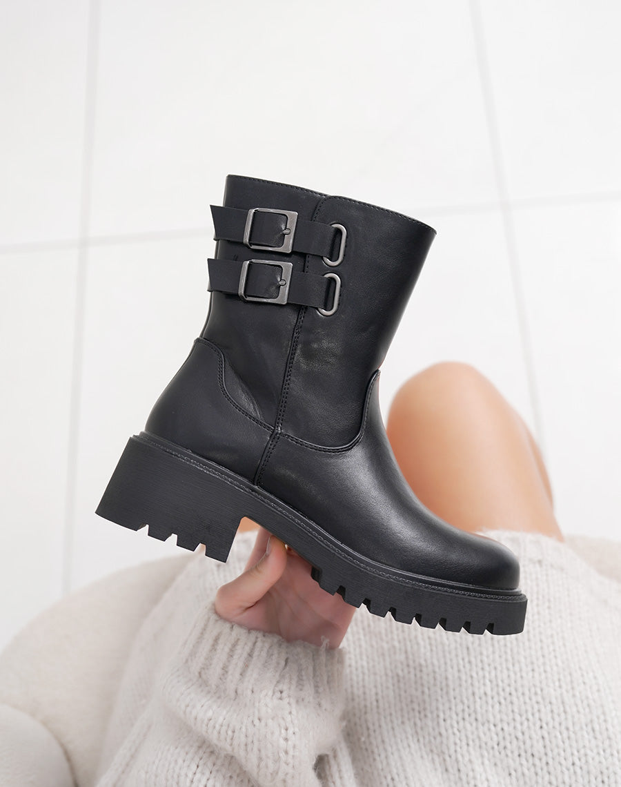 Bottines noires hautes à doubles sangles et semelle crantée