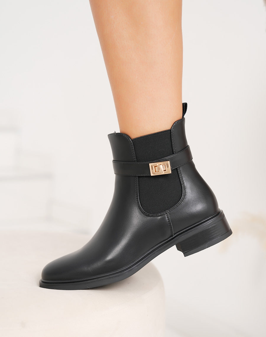 Bottines noires chelsea avec boucle dorée décorative