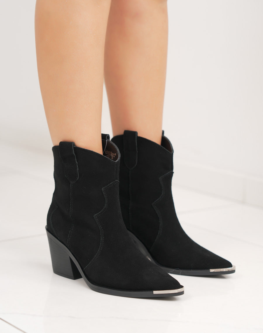 Bottines en cuir noir santiag à talon biseauté et bout pointu avec détail argenté